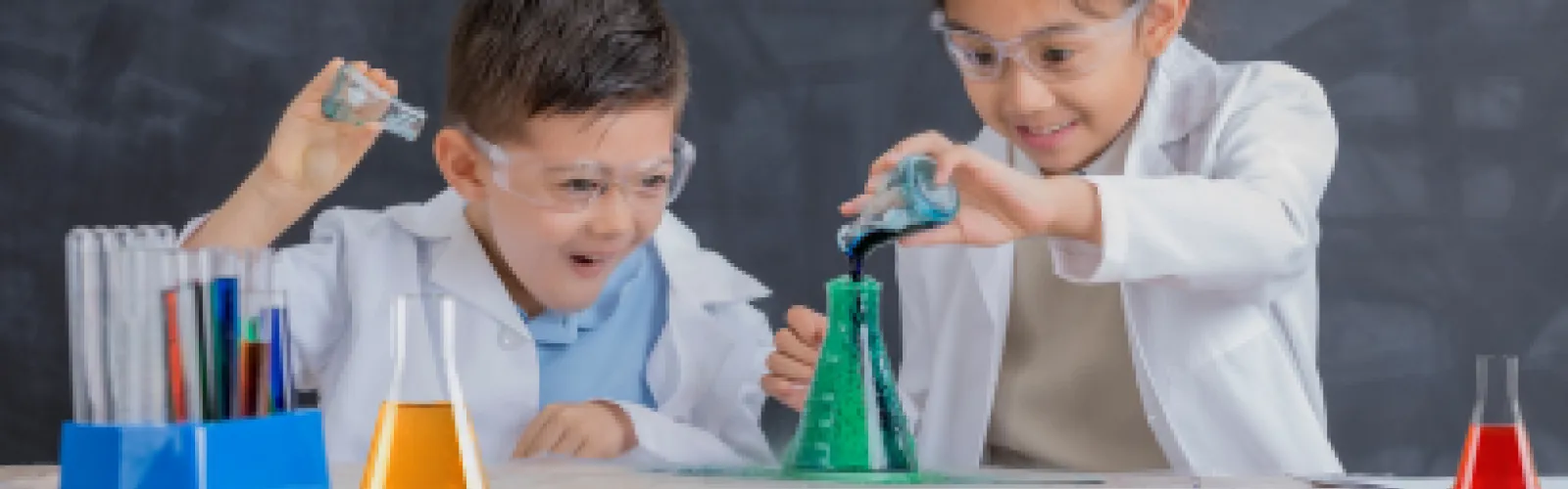 Kids with beakers and other lab equipment